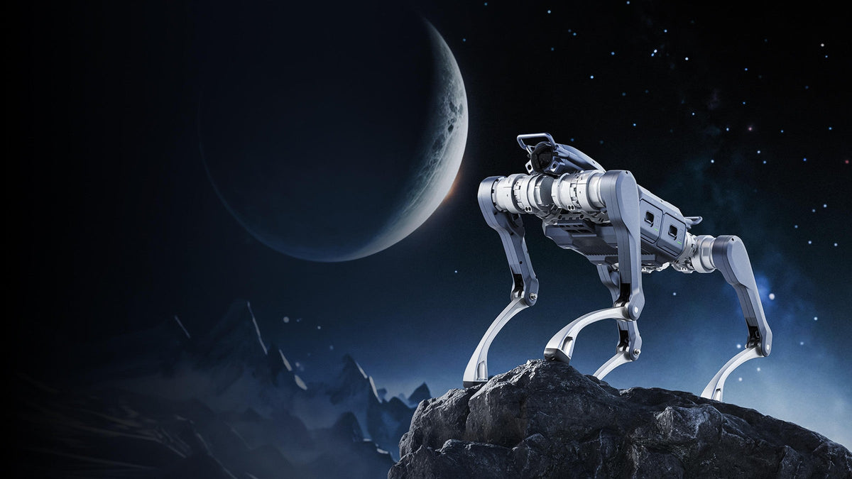 Unitree A2 quadruped robot on rocky ground under a crescent moon
